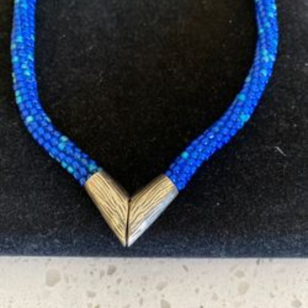 Necklace beautiful blue multi layered seed beads.